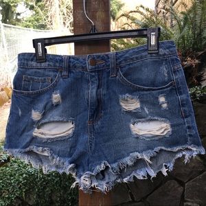 Distressed denim cut offs